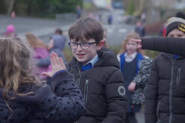 Still from the RTE Documentary Deaf not Dumb - Eoghan Freeman in class in St. Aidan's National School, Kiltimagh.